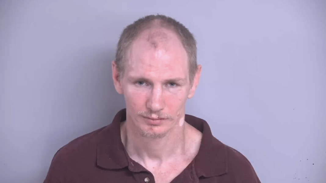 Arrested for fighting at gas station, escaping from hospital gurney