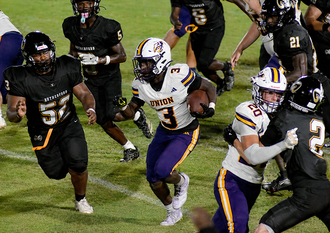 Tigers withstand Rutherford rally, win 35-34
