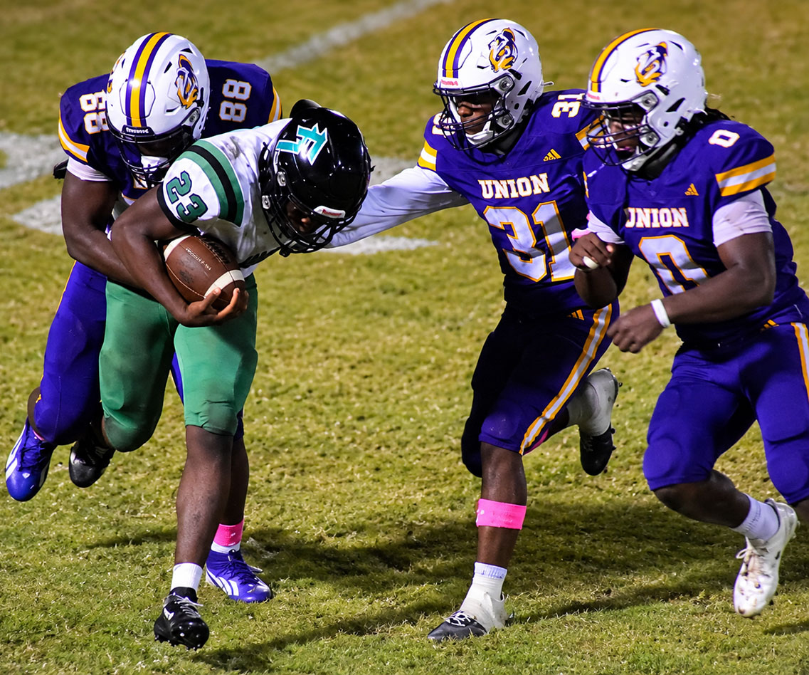 Tigers rush for 500-plus yards in 56-38 win